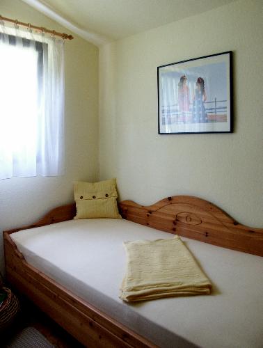 kleines Extrazimmer mit Bett
